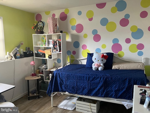 bedroom featuring hardwood / wood-style floors