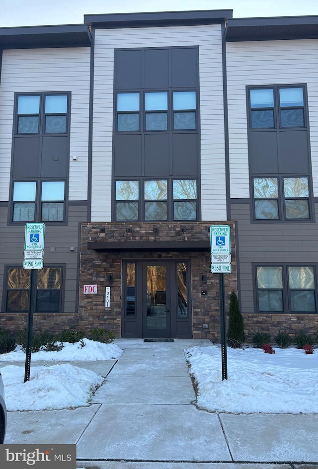 view of snow covered building