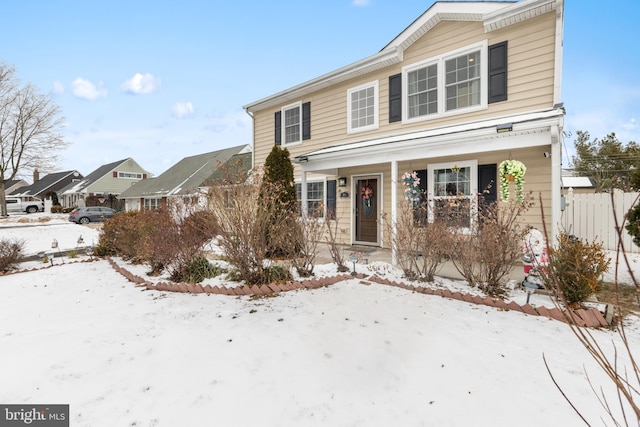 view of property featuring a porch