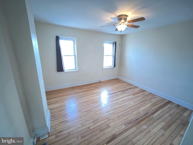 empty room featuring light hardwood / wood-style floors and ceiling fan