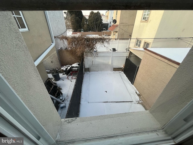 view of snow covered patio