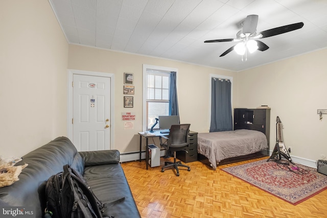 bedroom with baseboard heating, ornamental molding, and light parquet flooring