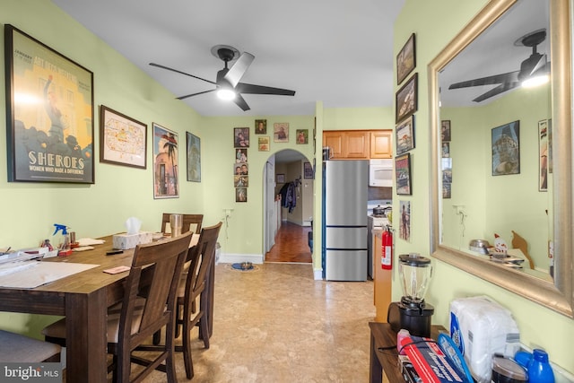 dining area with ceiling fan