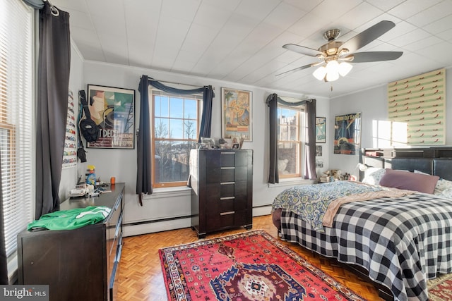 bedroom featuring ornamental molding, light parquet flooring, and a baseboard radiator