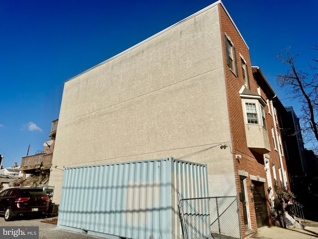 view of building exterior featuring a garage