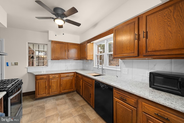 kitchen with sink, dishwasher, range with gas stovetop, and tasteful backsplash