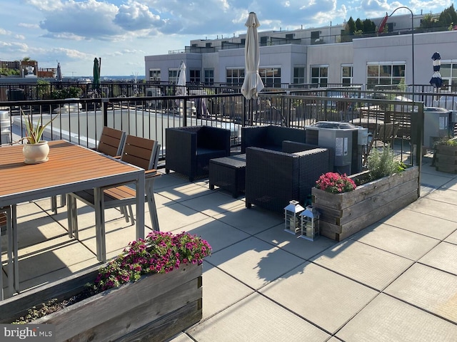 view of patio / terrace with a balcony