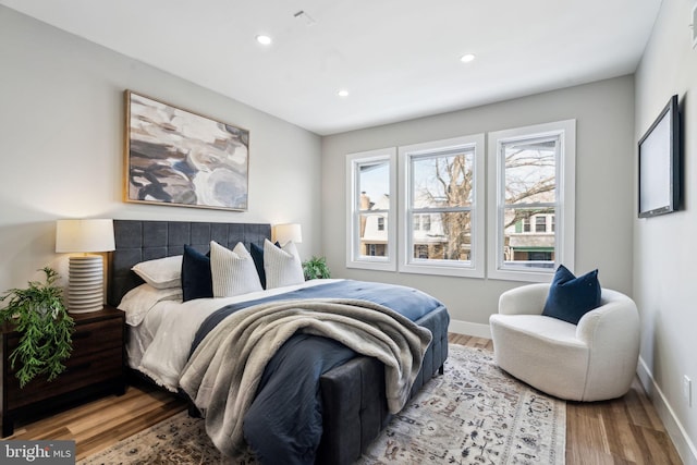 bedroom featuring hardwood / wood-style floors