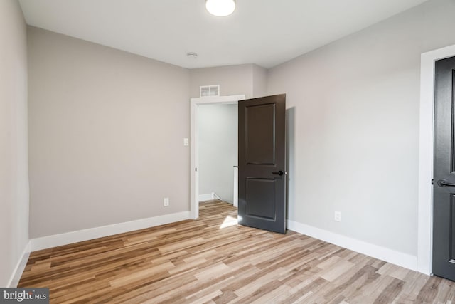 unfurnished bedroom featuring light hardwood / wood-style flooring