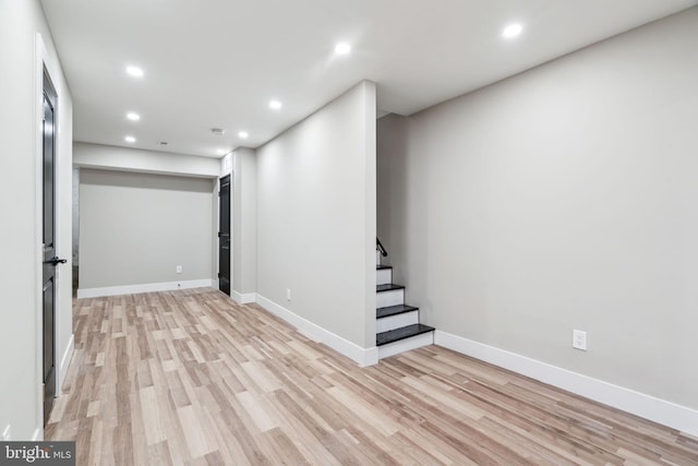 basement featuring light hardwood / wood-style floors