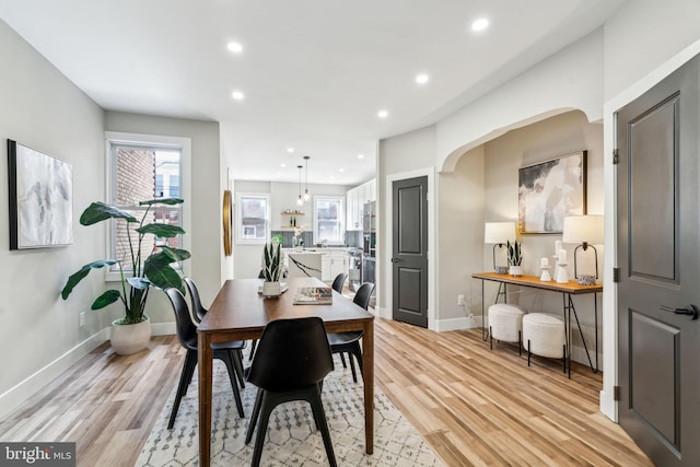 dining area with light wood-type flooring