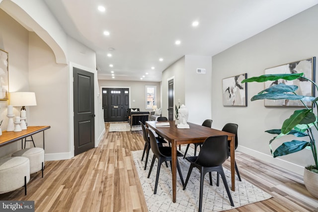 dining area with light wood-type flooring