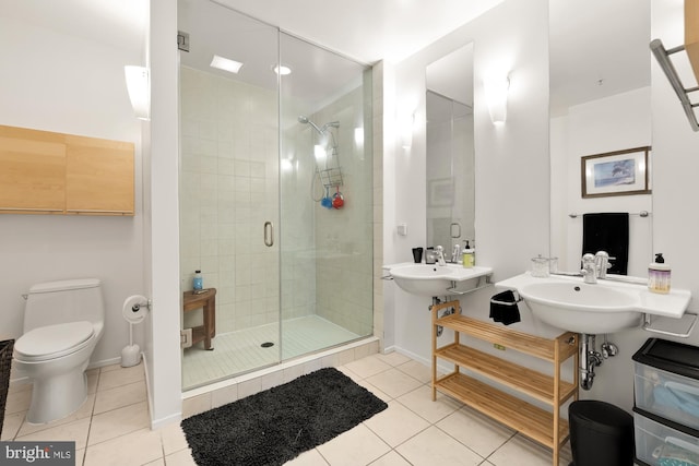 bathroom with walk in shower, tile patterned floors, and toilet