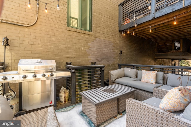 view of patio with an outdoor living space, grilling area, and a balcony