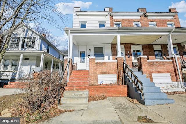 view of property with a porch