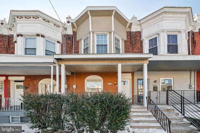 view of property featuring a porch