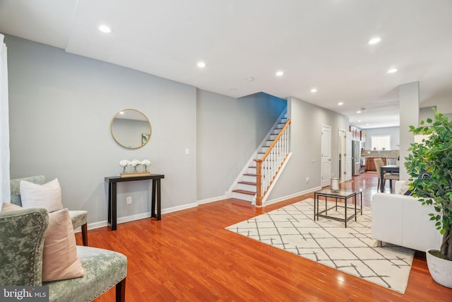 living room with light hardwood / wood-style floors