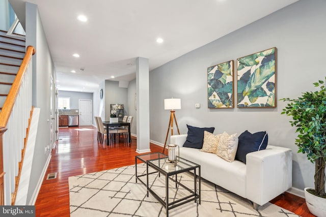 living room with hardwood / wood-style floors