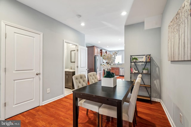 dining area featuring hardwood / wood-style flooring