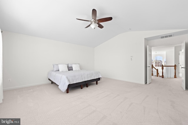 bedroom with light carpet, lofted ceiling, and ceiling fan