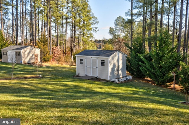 view of outbuilding featuring a yard