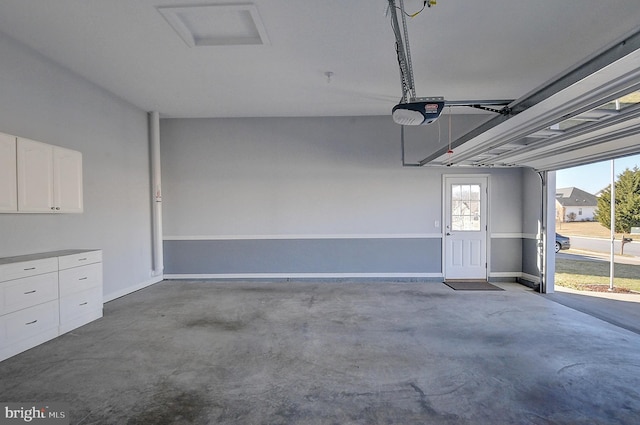 garage featuring a garage door opener