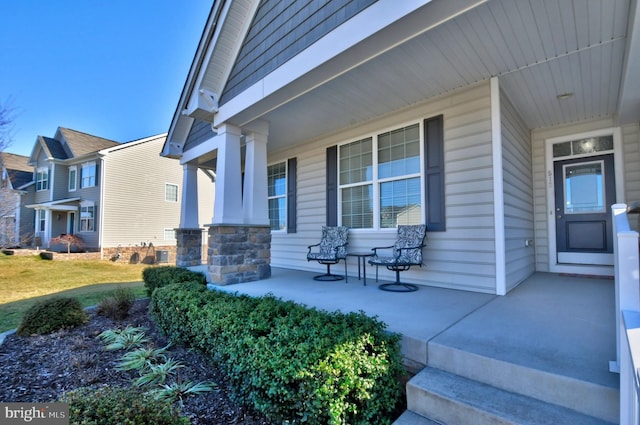 doorway to property with a porch