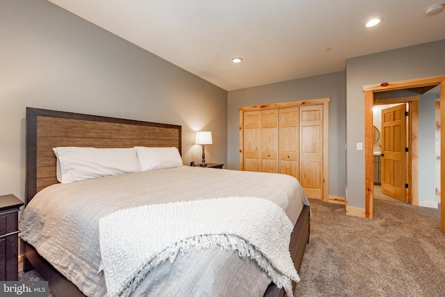 carpeted bedroom with a closet