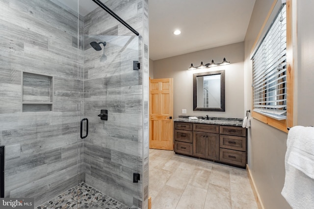 bathroom featuring vanity and walk in shower