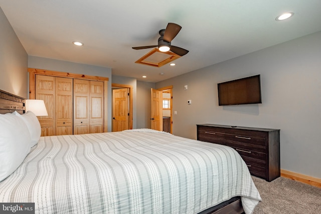 carpeted bedroom with ceiling fan