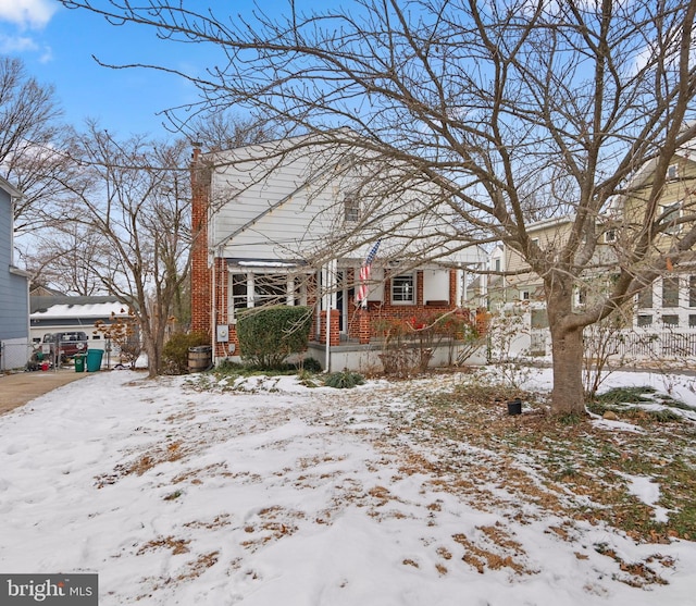 view of snow covered property