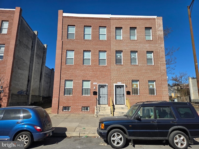 view of building exterior with entry steps