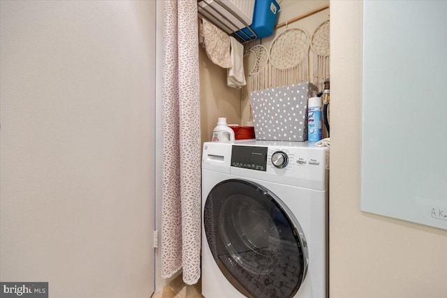 laundry room with washer / clothes dryer