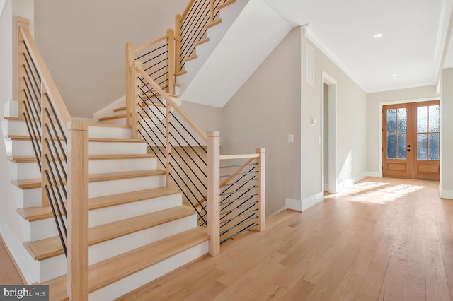 interior space featuring hardwood / wood-style flooring and french doors