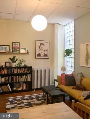 living area featuring radiator heating unit