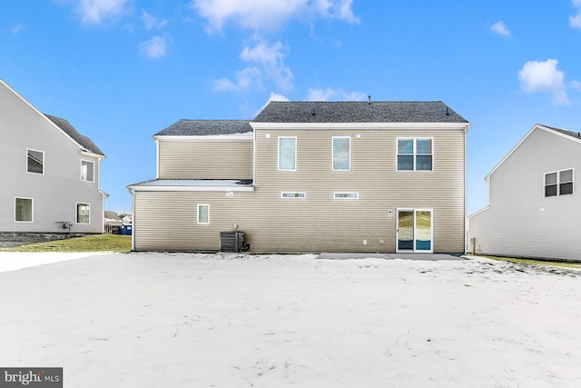 back of property with central AC unit