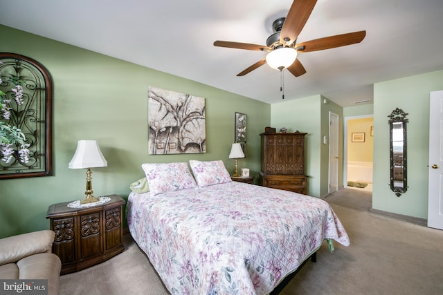 carpeted bedroom with ceiling fan