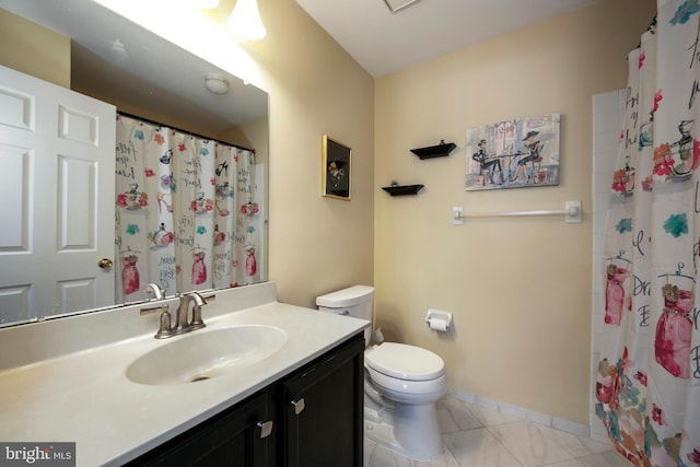 bathroom with vanity, a shower with curtain, and toilet