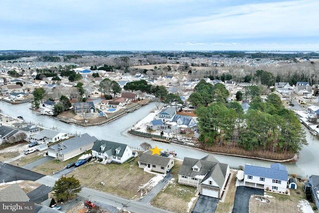 drone / aerial view with a water view