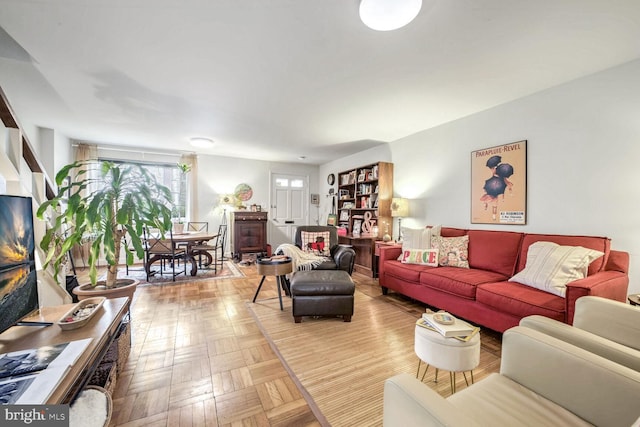 living room with parquet flooring