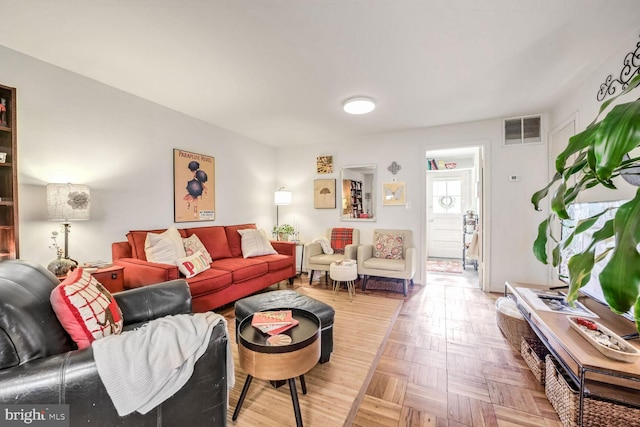 living room with parquet floors