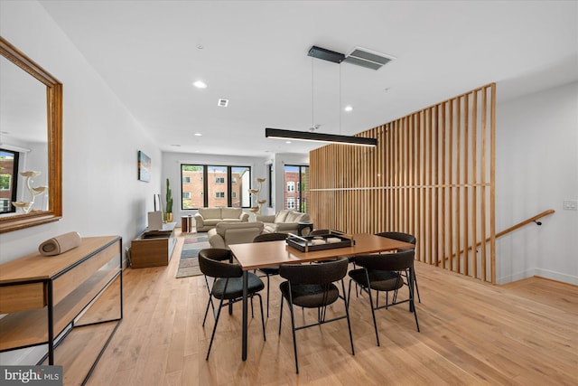 dining area with light wood-type flooring