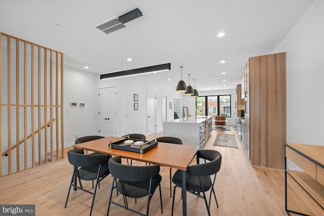 dining area featuring light hardwood / wood-style flooring