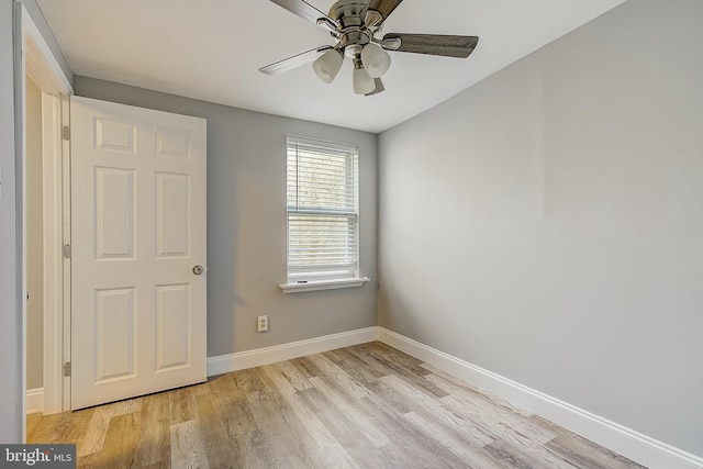 unfurnished bedroom featuring ceiling fan and light wood-type flooring