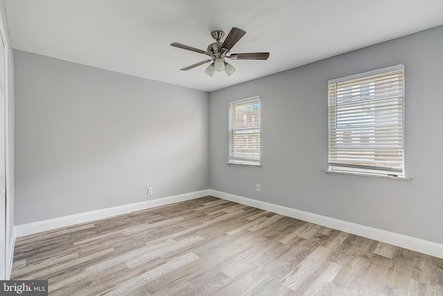 unfurnished room with light hardwood / wood-style flooring and ceiling fan