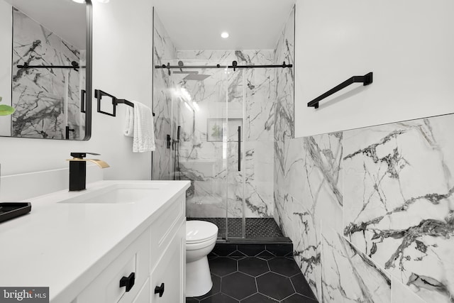 bathroom with vanity, toilet, tile patterned floors, and an enclosed shower