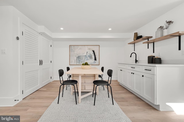 dining room featuring light wood-type flooring