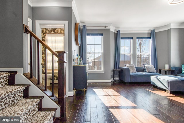 interior space with dark hardwood / wood-style floors and ornamental molding