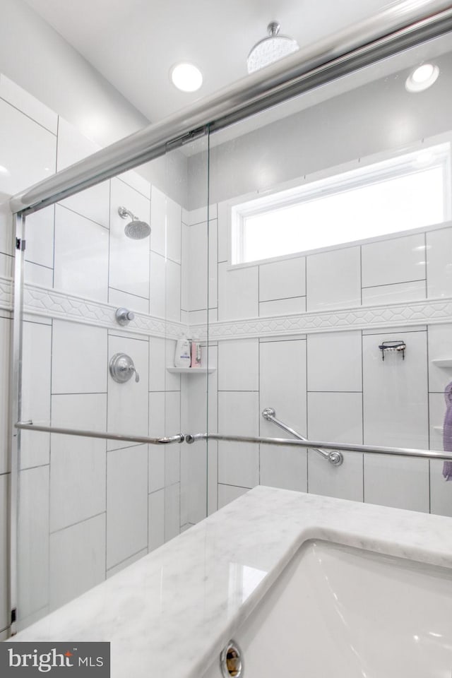 bathroom featuring walk in shower