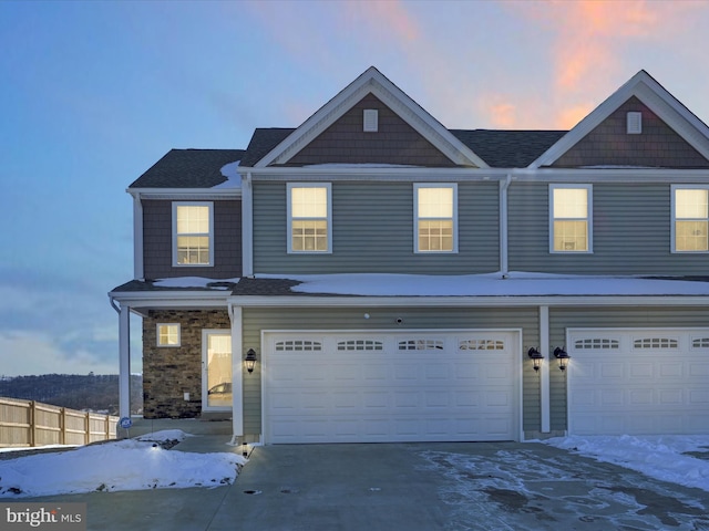 view of front of property featuring a garage